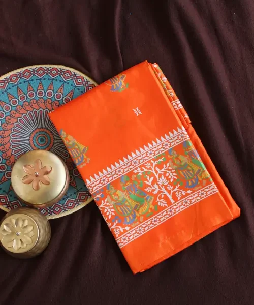 Orange printed silk replica saree with Bishnupuri work