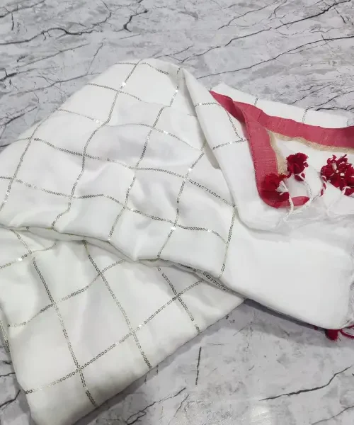 White Khadi saree with sequins and red tassles