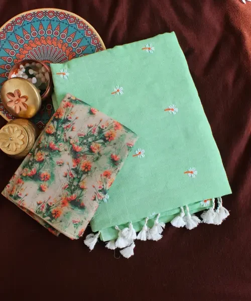 Light green Khadi saree with flower motifs